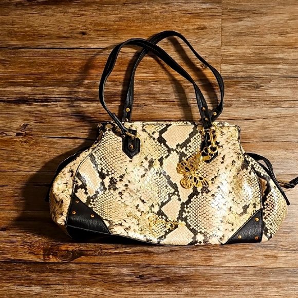 Jessica Simpson Elegant Snake Print Handbag with Black Accents & Butterfly Charm - Picture 1 of 7
